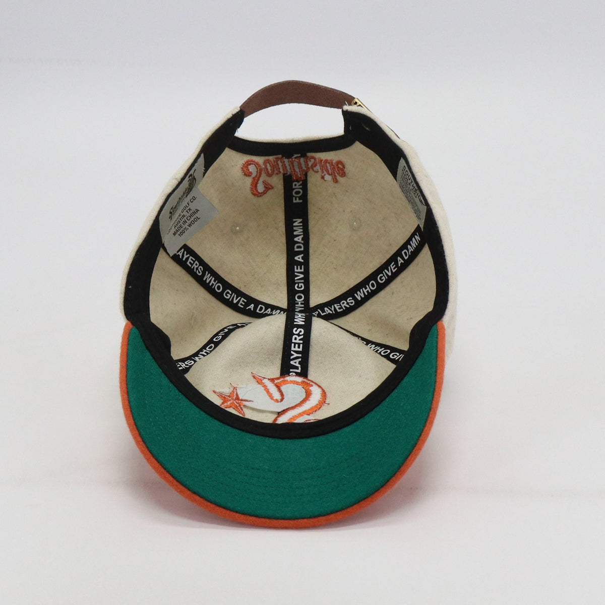 Interior of Southside Golf Co heritage golf hat showing premium wool lining and custom taping detail
