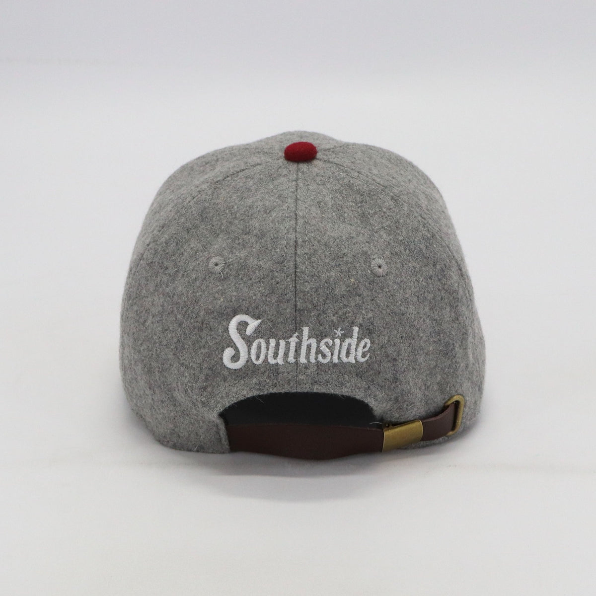 Southside Golf Co heritage wool golf hat back view with leather strap and embroidered Southside logo on grey cap