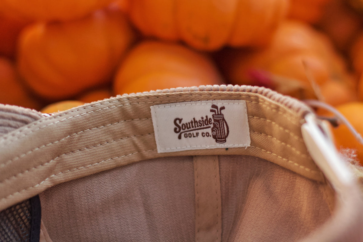 Interior stitching and woven label of Southside Golf Co Heritage corduroy 5-panel hat
