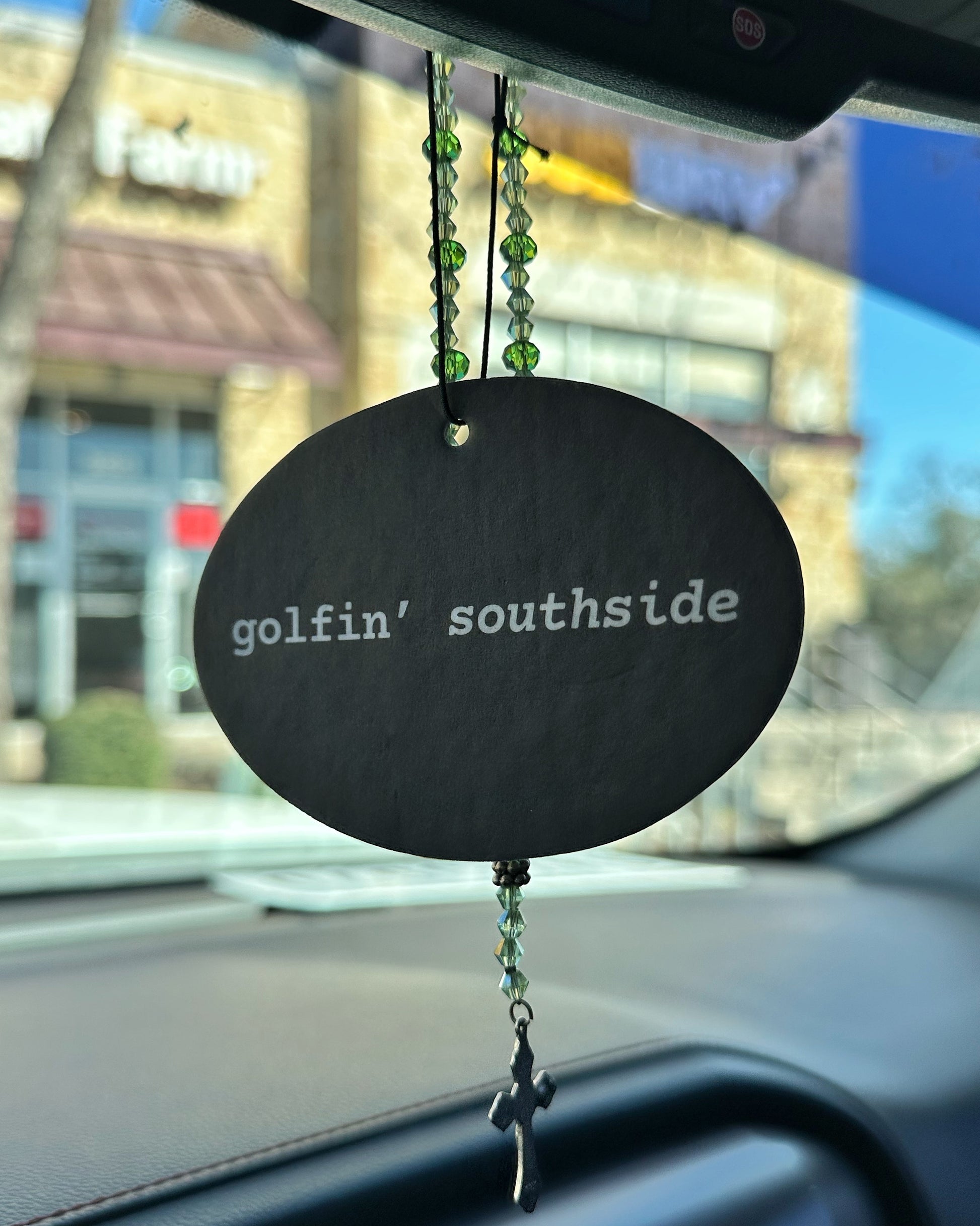 Southside Golf Co “golfin’ southside” car air freshener hanging from rearview mirror