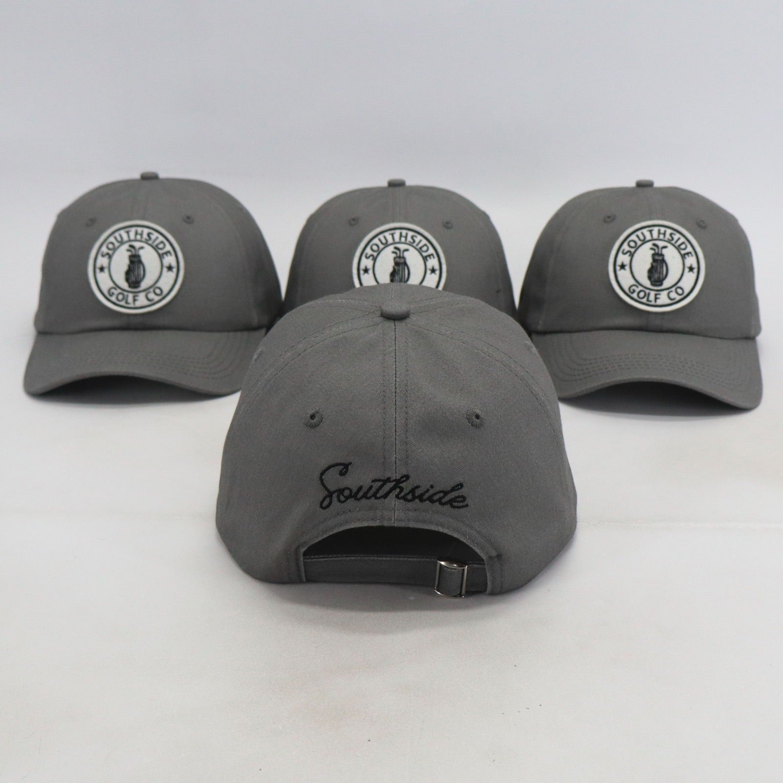 Southside Golf Co gray dad hat rear view showing embroidered ‘Southside’ script and adjustable strap on white background.