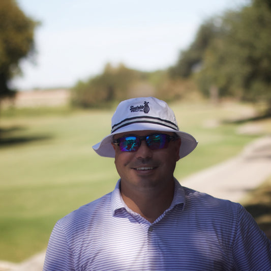 PGA professional wearing Southside Golf Co hat at Forrest Creek Golf Club Austin Texas